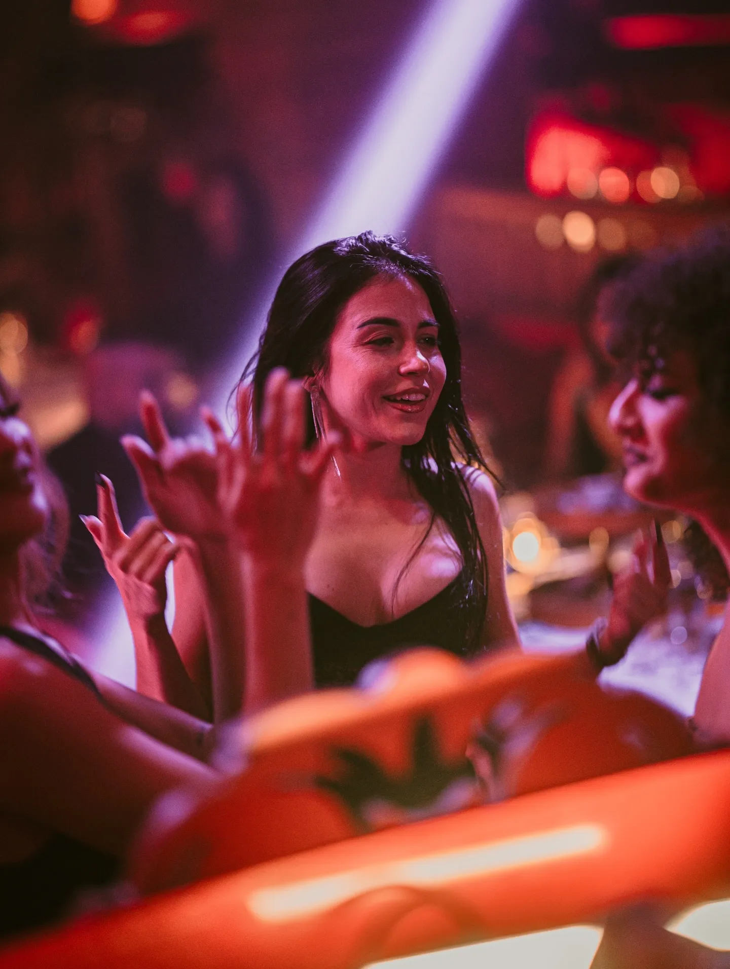 Guests with hands raised on the floor at The Club Agadir